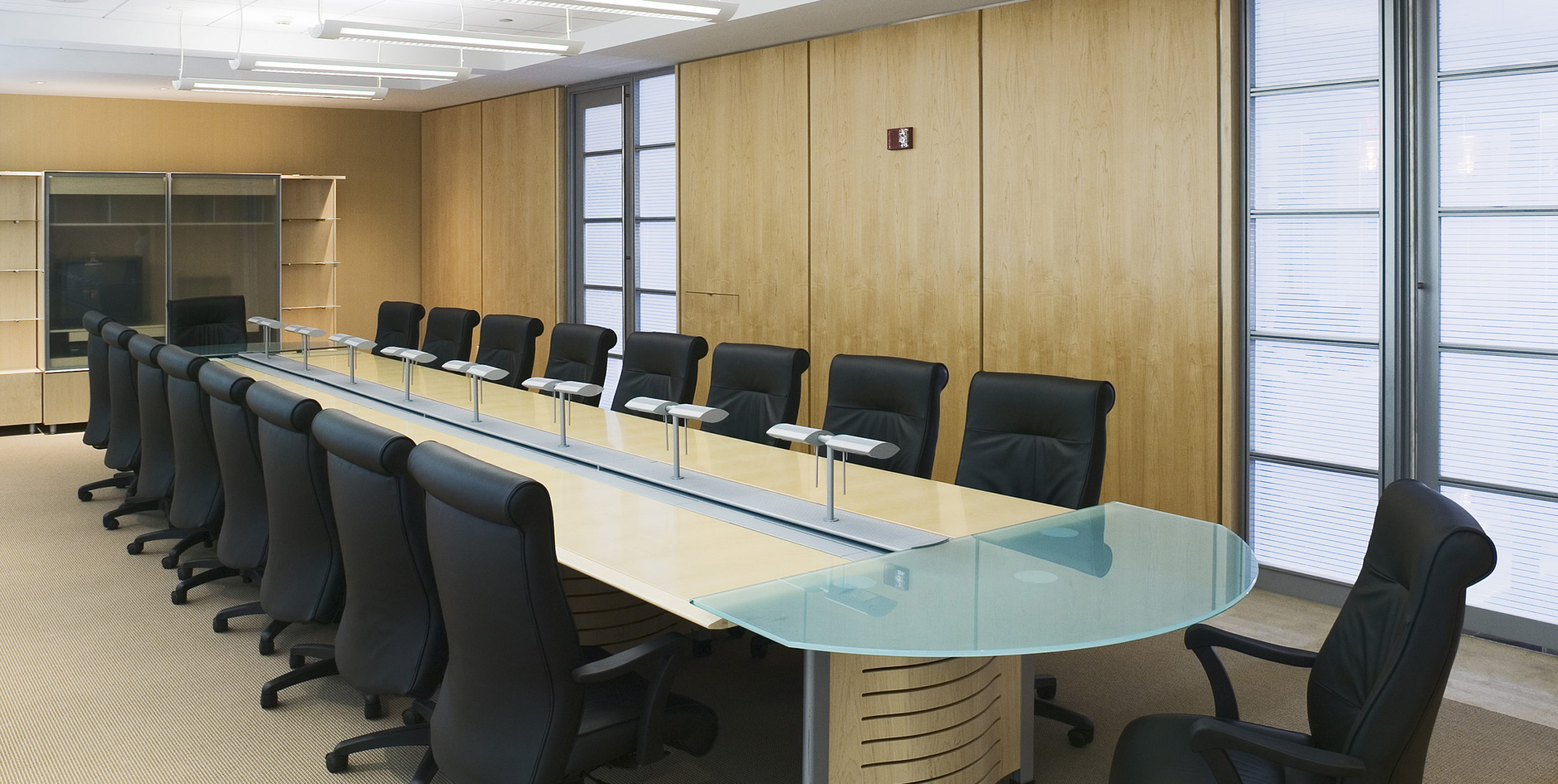 Conference room with 18 chairs at First Empire Securities at 100 Motor Parkway, Hauppauge