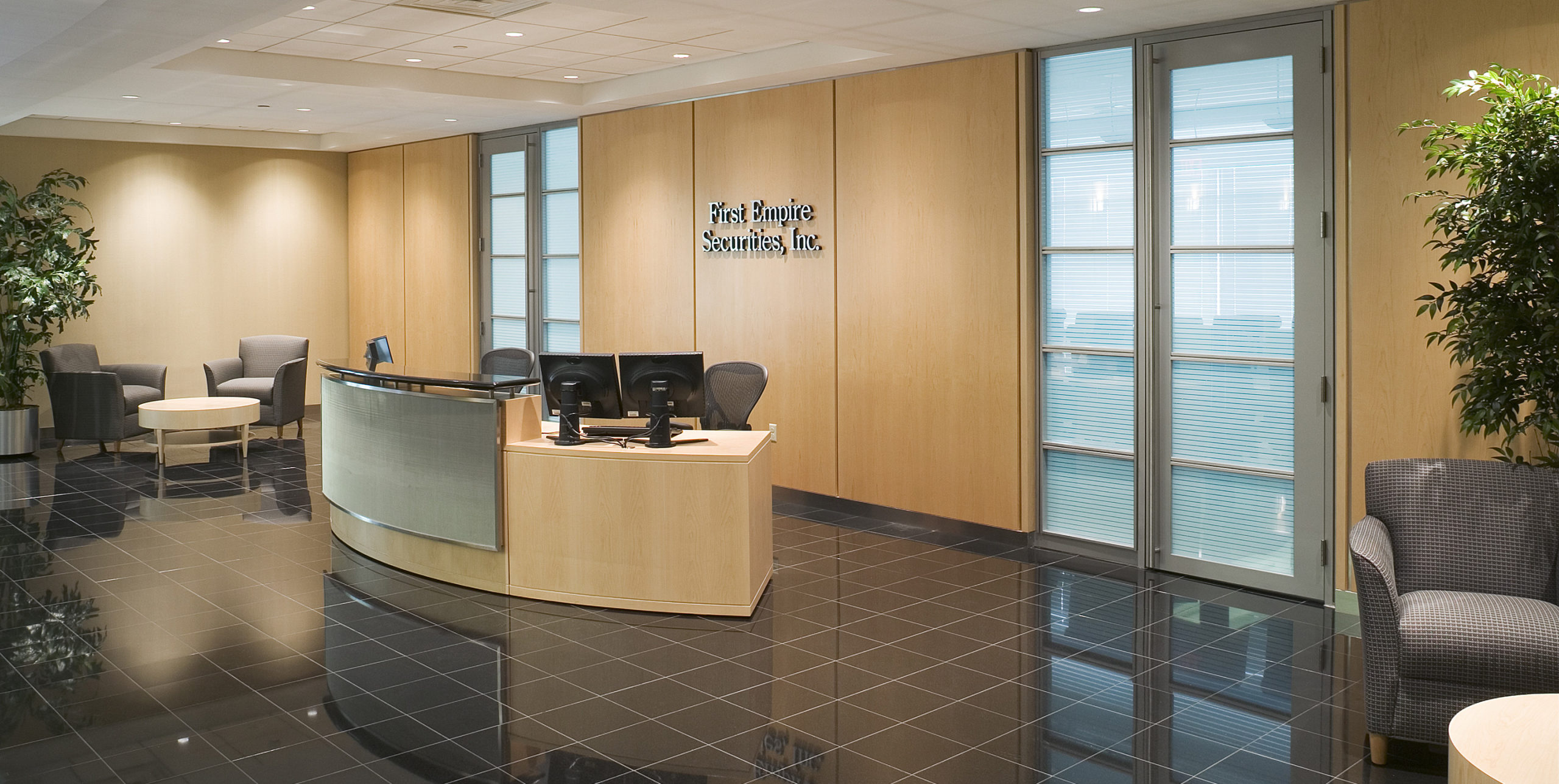 Lobby and front desk reception at First Empire Securities at 100 Motor Parkway, Hauppauge