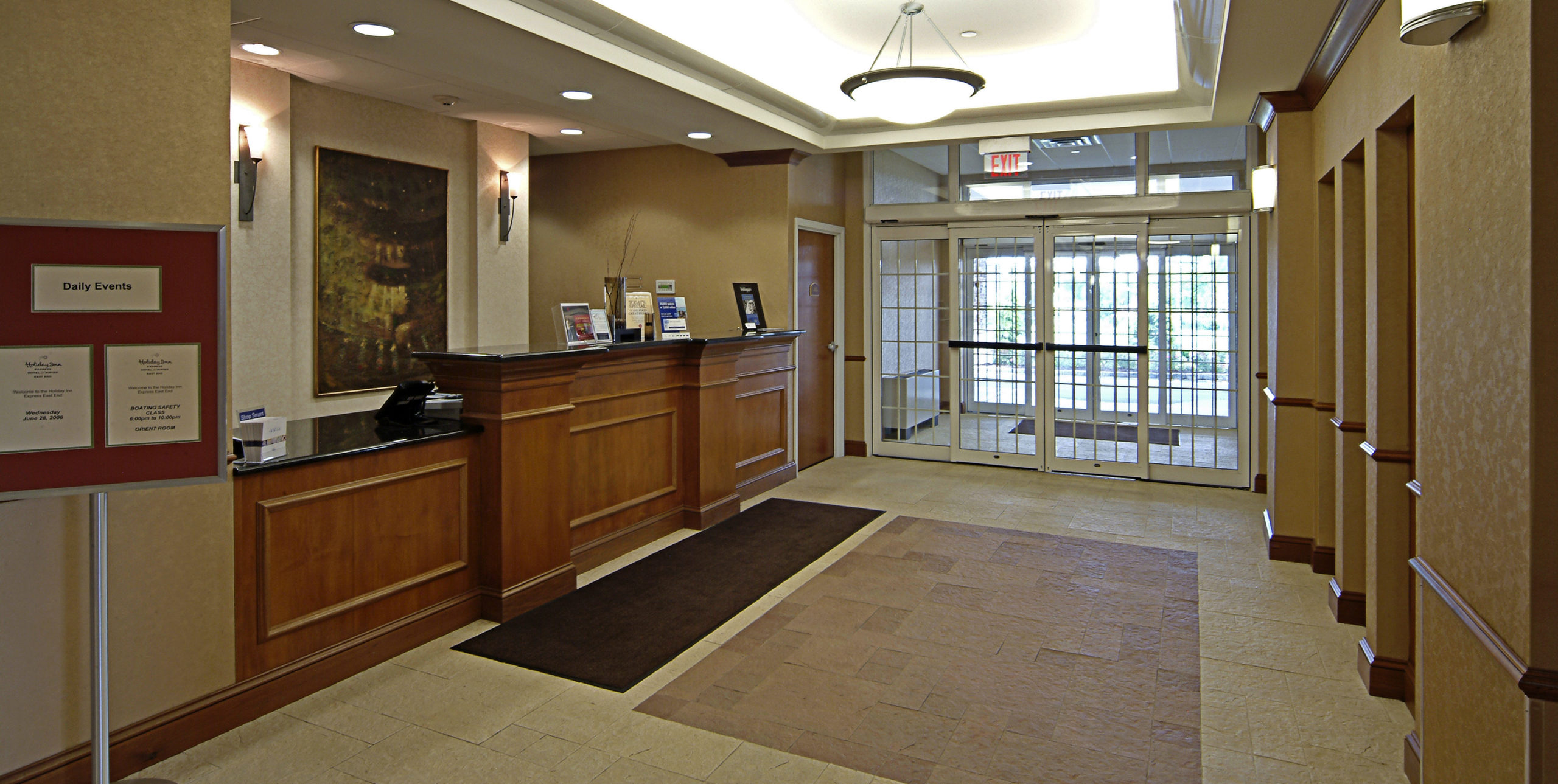 Front desk reception at Holiday Inn Express at 1707 Old Country Road, Riverhead