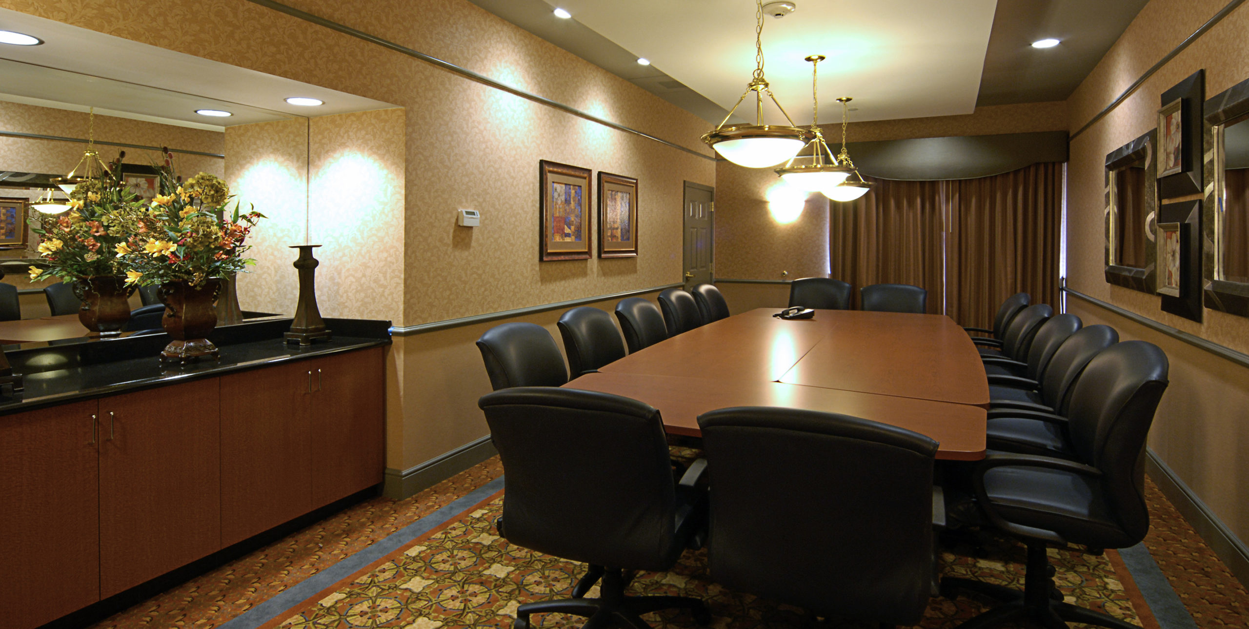 Conference room with 14 chairs at La Quinta Inn and Suites by Wyndham Islip at 10 Aero Road, Bohemia