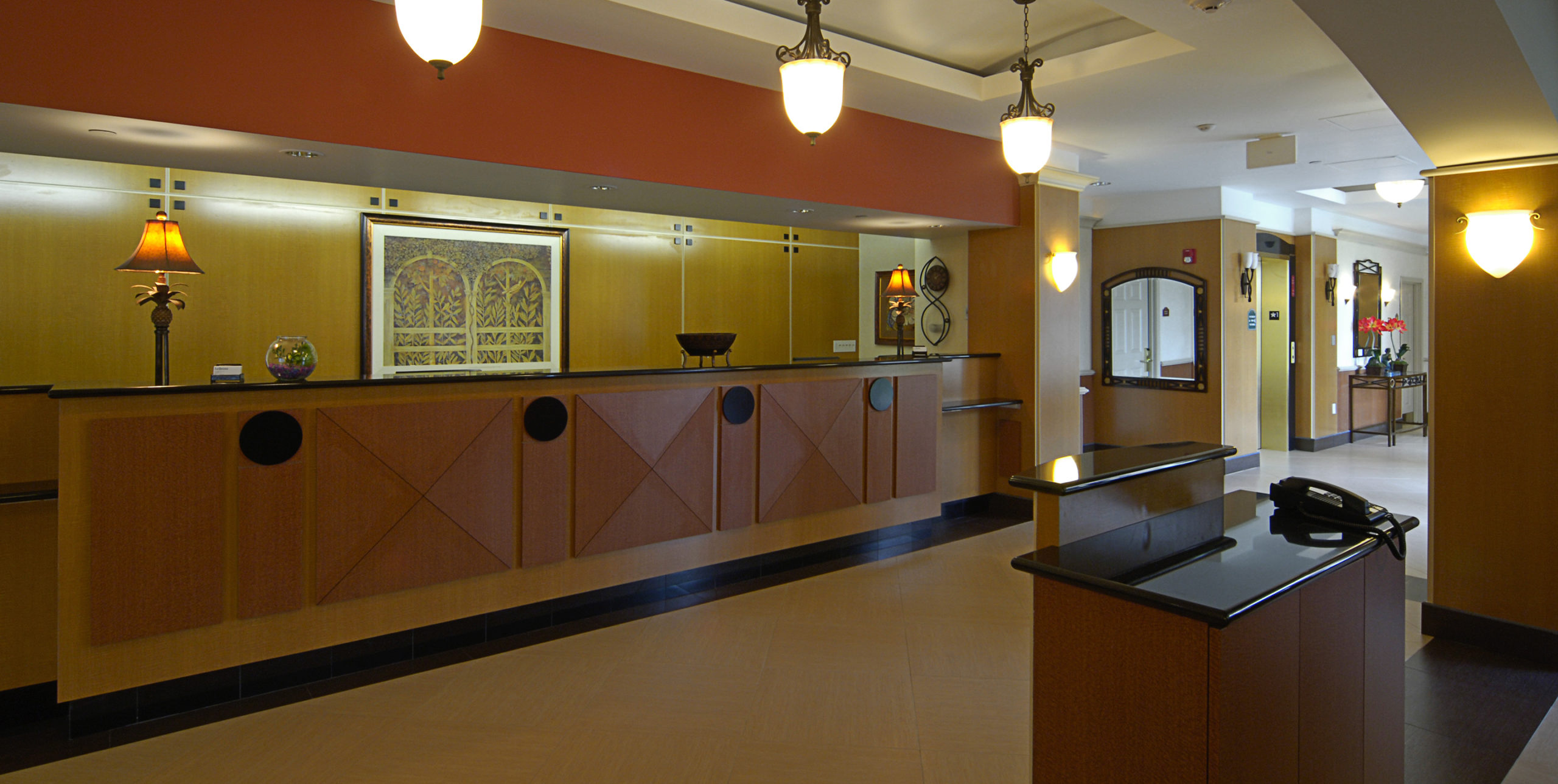 Front lobby reception area at La Quinta Inn and Suites by Wyndham Islip at 10 Aero Road, Bohemia