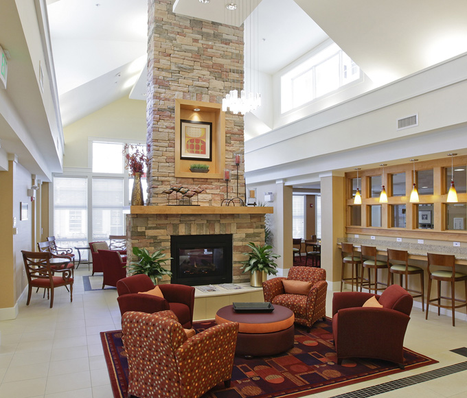 Lobby seating in front of a fireplace at Residence Inn by Marriott in Yonkers