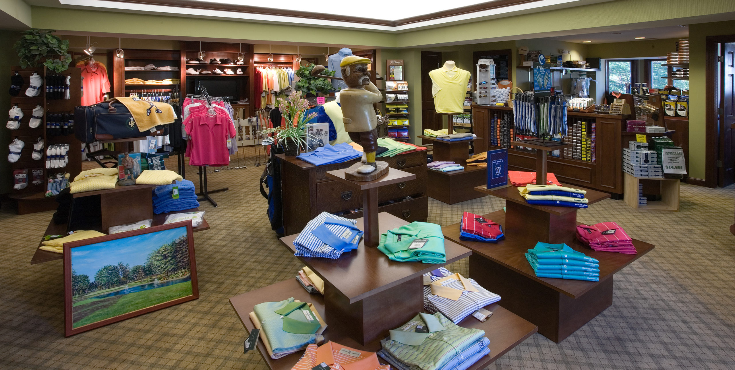 The merchandise room with displays of clothing at Rockville Links Golf Club