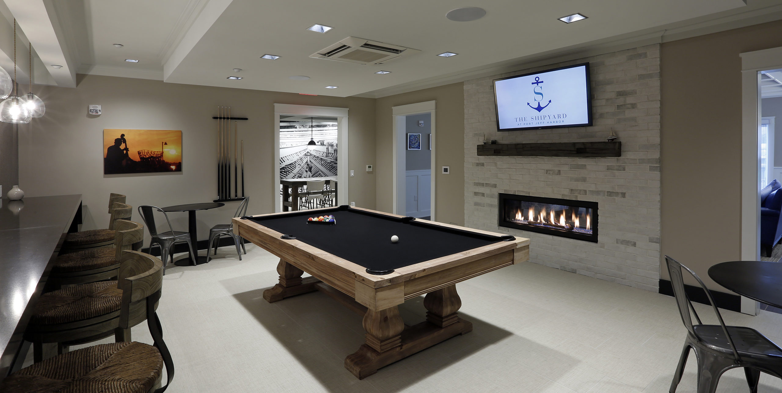 Pool table in a recreational room at The Shipyard at Port Jeff Harbor