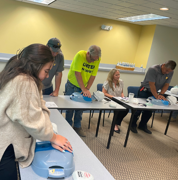 TRITEC Employees learning CPR