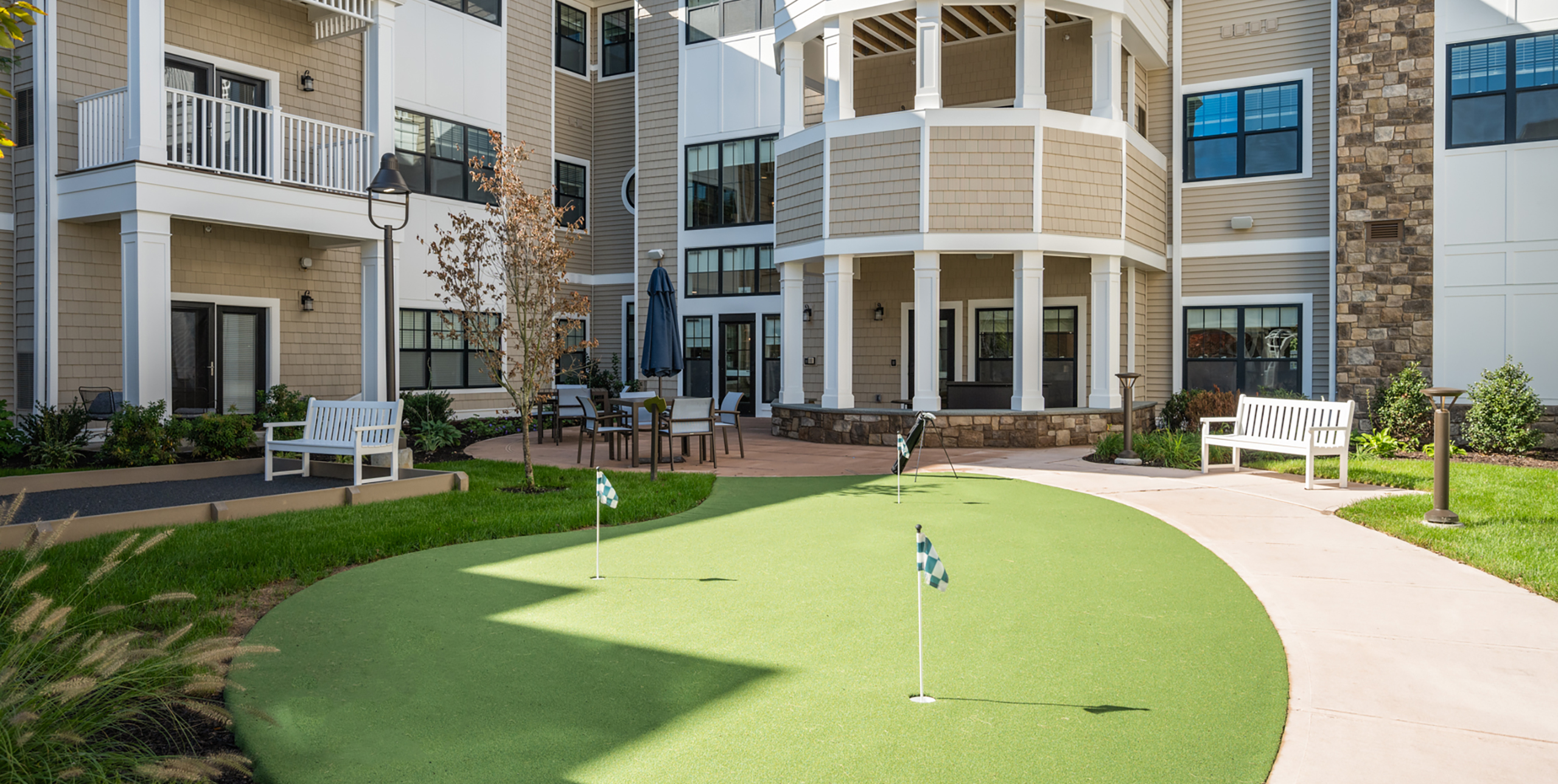 Putting green in the courtyard at Brightview Senior Living in Port Jeff