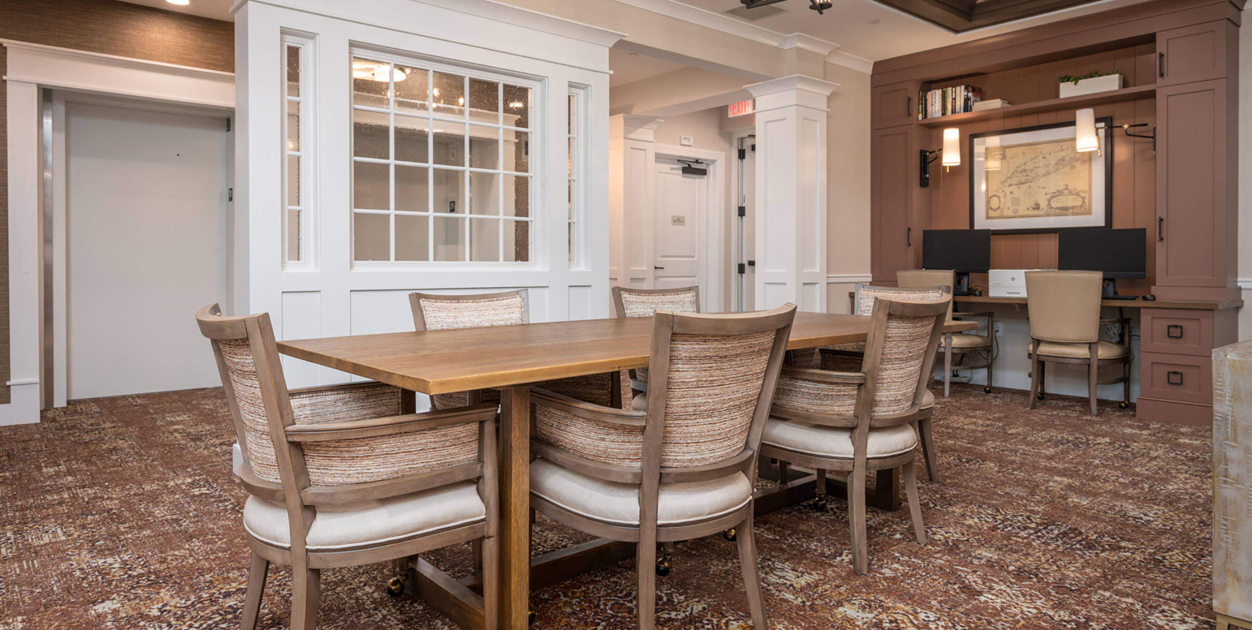 Dining room table with six chairs at Brightview Senior Living Port Jeff