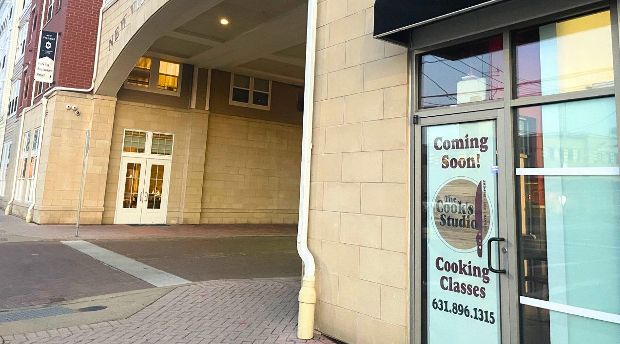 Cook's Studio coming soon signage at New Village at Patchogue