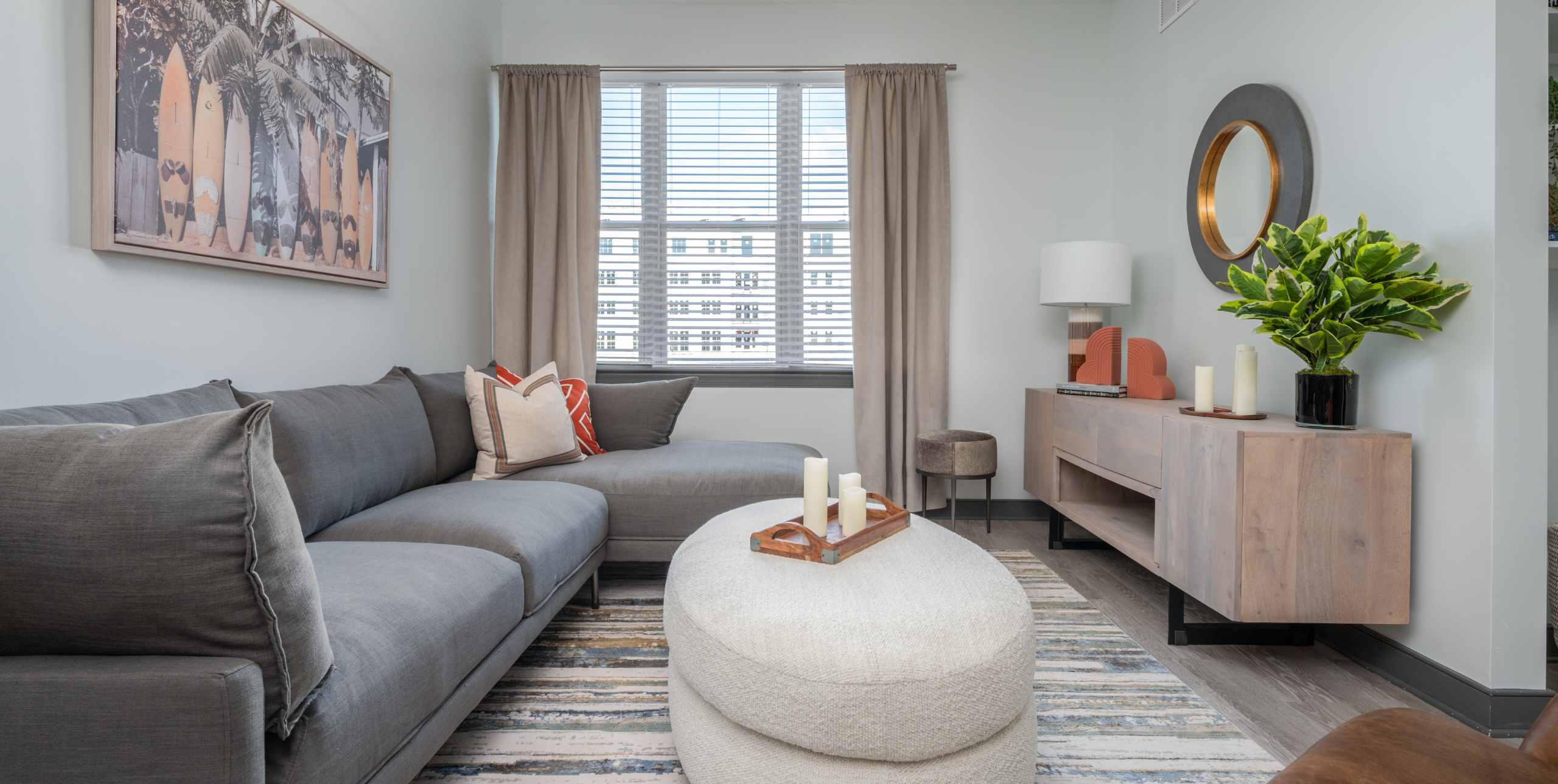 A staged living room in a model apartment at The Core in Ronkonkoma