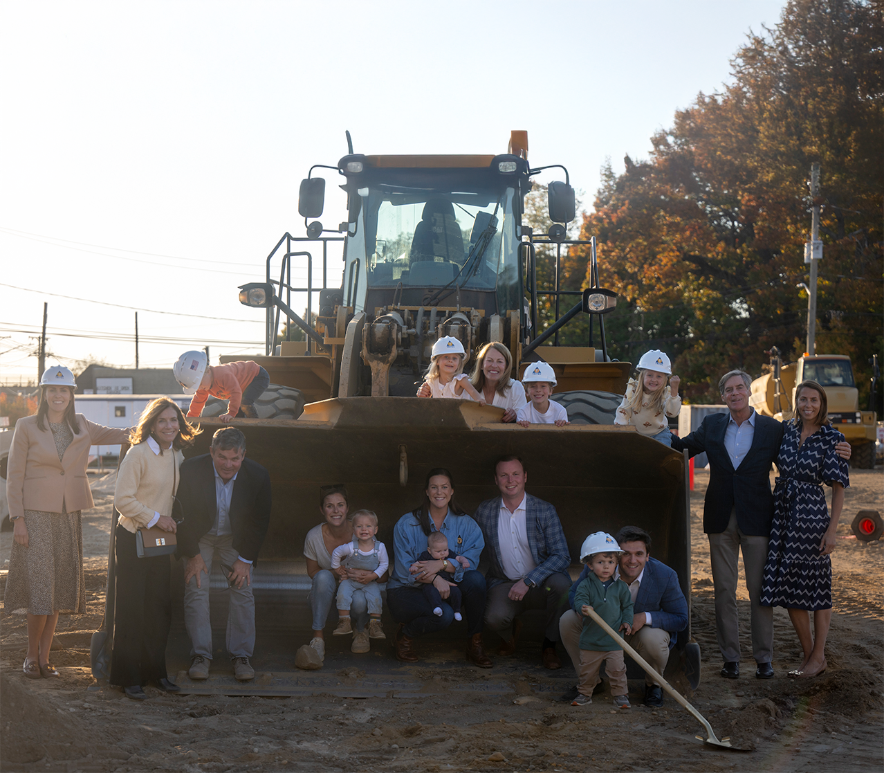 Bob and Jim Coughlan with their wives, children, and grandchildren