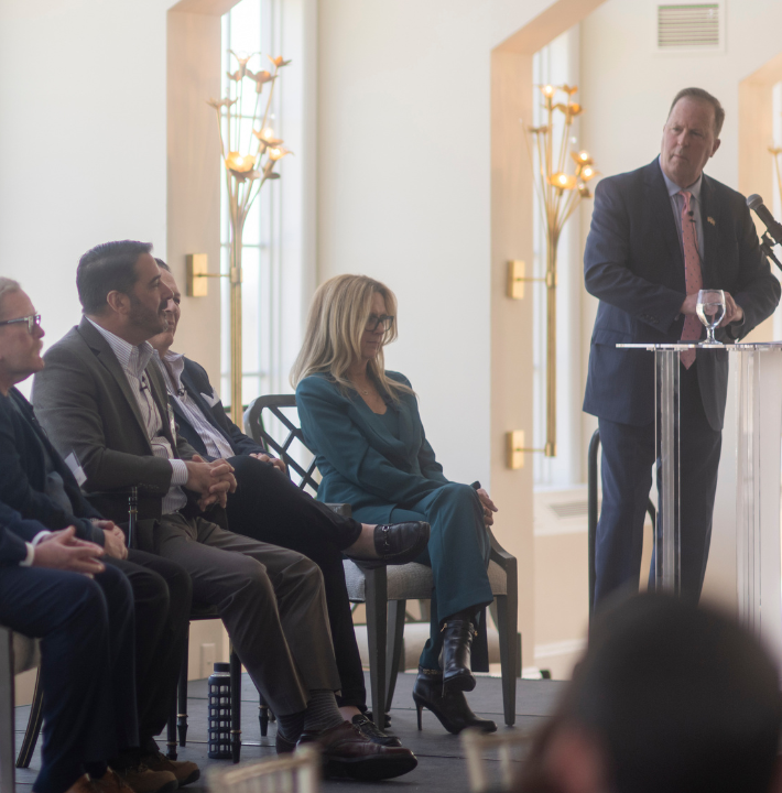 Kevin Law moderating the Real Estate Institute at Stony Brook University's Spring Luncheon