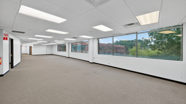 large office floor of suite 210 of 45 research way