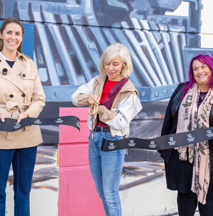 Station Yards mural ribbon cutting with Lula Goce, Meaghan Coughlan Treat, and Beth Giacummo